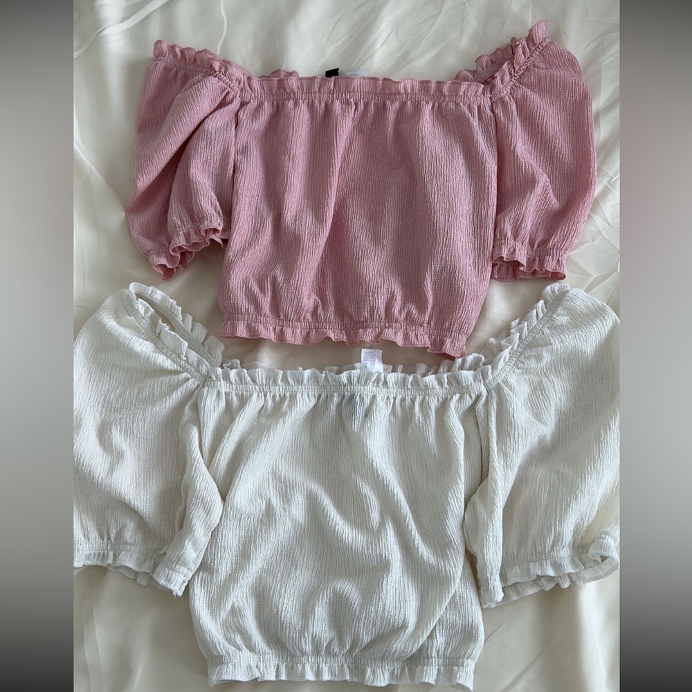 2 off the shoulder tops, light material, white top is a medium & pink is small!